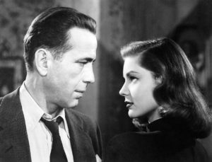 Humphrey Bogart as Marlowe, with Lauren Bacall as Vivian Rutledge in The Big Sleep